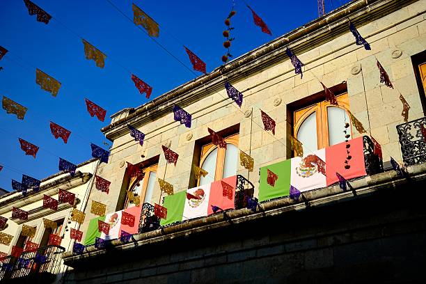 istock Mexican Flags and Papel Picado on Historic Building (Oaxaca de Juarez, Mexico) 2247472104