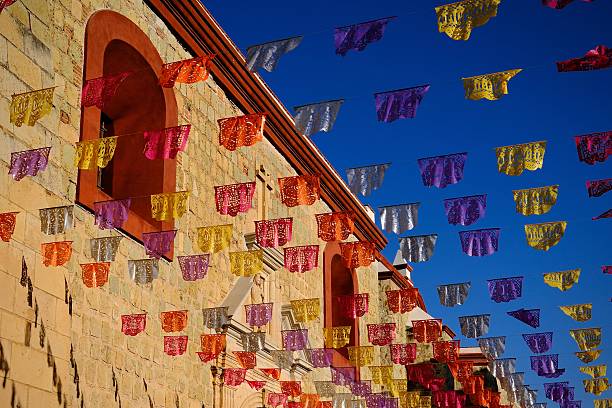istock Papel Picado Along Historic Stone Buildings (Oaxaca de Juarez, Mexico) 2247472105