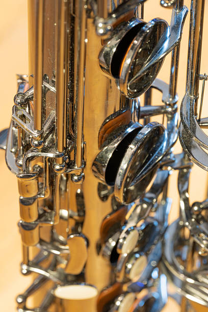 Close-up of man playing saxophone on a live concert