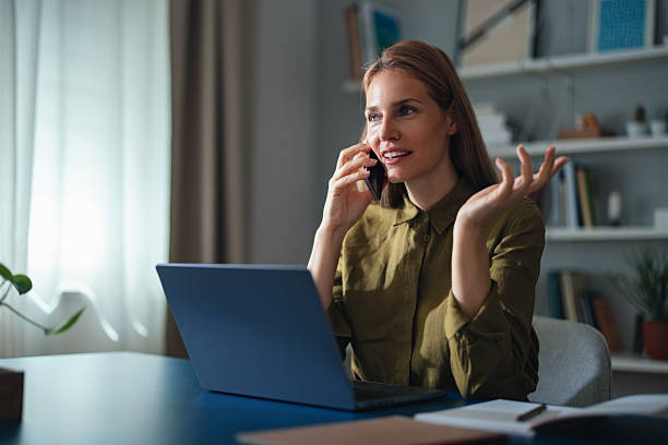 istock Professional Woman On Call At Home Office With Laptop, Engaged In Conversation And Work 2247473767