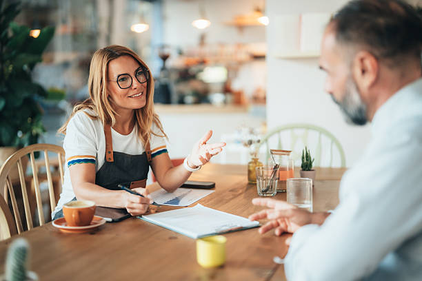 istock Small business owner discussing financing options with loan agent 2247474118