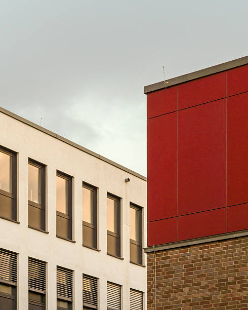 istock Modern office buildings reflecting the sunset in urban landscape 2247474734