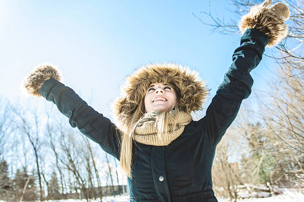 Attractive young woman in wintertime outdoor