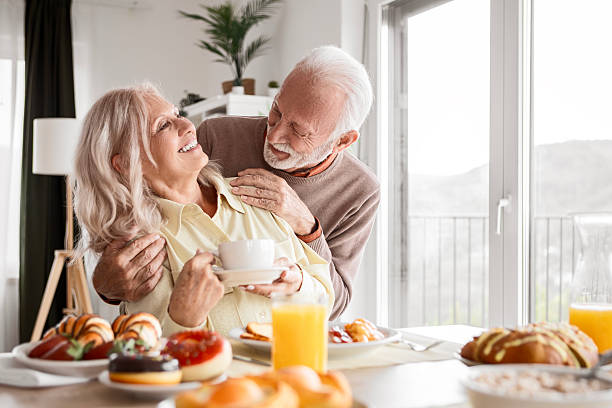 istock Happy Senior Couple Starting the Day with Coffee 2247477486