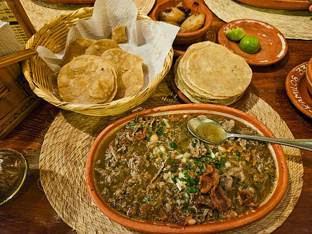 Authentic Mexican 'Carne en su Jugo' with beef, beans, and fresh corn tortillas