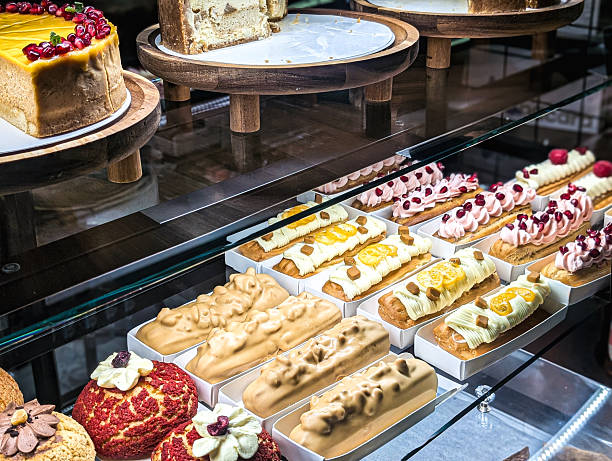 istock gourmet pastries and cheesecake in bakery display case for sale 2247481574
