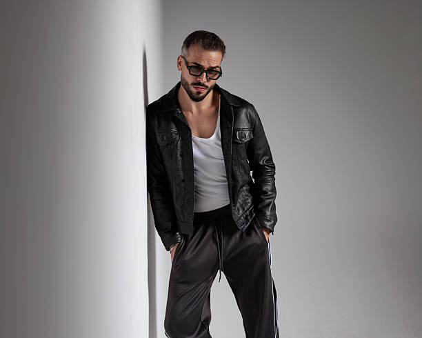istock confident bearded man with sunglasses holding hands in pockets 2247486263
