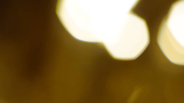 istock Soft shimmering golden shapes create a warm atmospheric Christmas light scene 2247488216