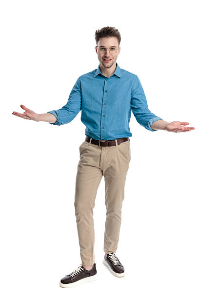 istock Happy casual man standing with open arms welcoming 2247488393