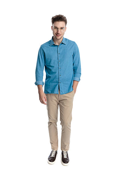 istock Happy casual man walking forward and smiling 2247488686