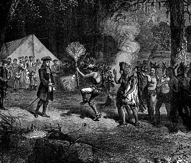 William Henry Harrison meets with Chief Tecumseh, Tenskwatawa the Prophet, and the Shawnee people at Vincennes, Indiana, USA (circa 1810). Vintage etching circa 19th century.
