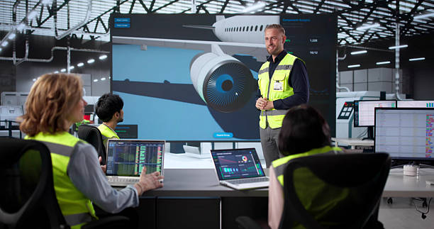 istock Professionals Meet To Discuss Aircraft Engine Safety Check Software 2247505096