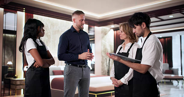 istock The Hotel Manager Leading A Team Meeting 2247505459
