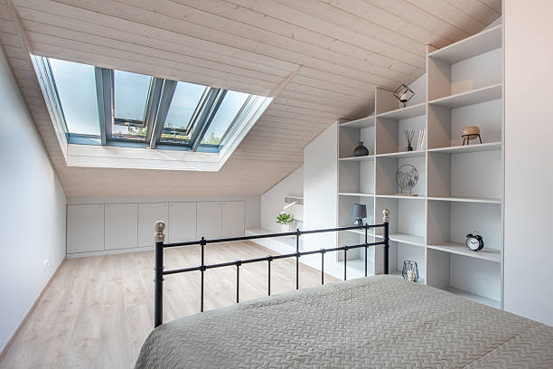 istock Modern Attic Bedroom With Loft Windows and Minimalist Interior Design 2247507853