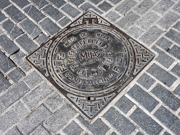 Mijas, Andalusia, Spain - September 26, 2025: Sewer manhole in Mijas