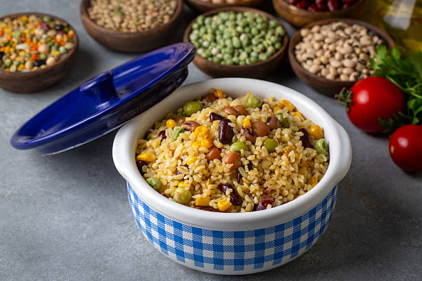 istock Bulgur pilaf with legumes; with peas, beans and corn kernels. 2247508956