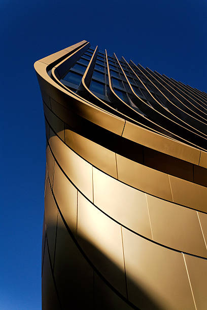Masarycka MSD Masaryk Station Development office and retail building by Zaha Hadid Architects with golden facade on November 19, 2025 in Prague, Czech Republic.