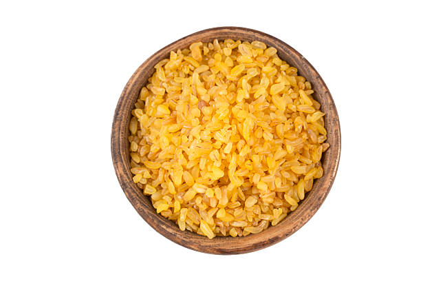 istock Heap of dry bulgur isolated on white 2247521217