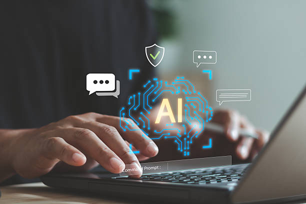 istock Person hands typing on laptop with glowing AI interface, representing digital innovation, intelligent communication and advanced technology for modern data-driven solutions and smart workflow systems. 2247522058