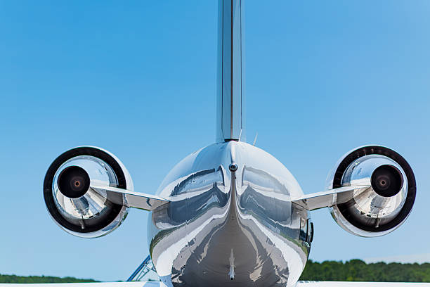 istock Rear view of dual-engine business jet 2247524658