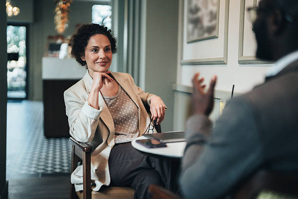 istock Business people having Positive Discussion at the Cafe 2247527754