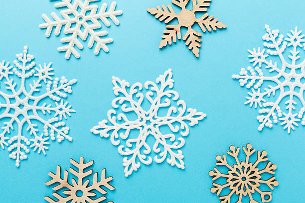 istock Beautiful snowflake on color background, top view 2247528275