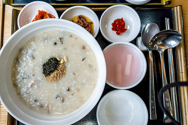 istock Korean Rice Porridge (known as Juk) served with sidedishes 2247536184