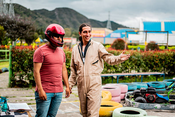 Go cart drivers racing on track