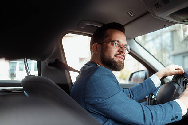 istock Businessman Driving Car 2247542655
