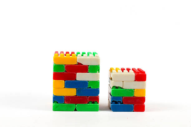 istock Colorful used plastic blocks forming a chimney isolated on a white background 2247545985