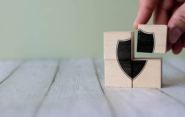 istock Wooden cube with an open and closed lock pattern. Day of protection of personal data. 2247548967