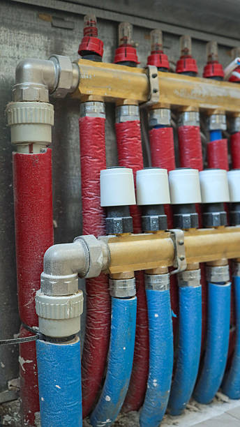 istock Close-up of a heating system manifold with pipes and valves 2247549315