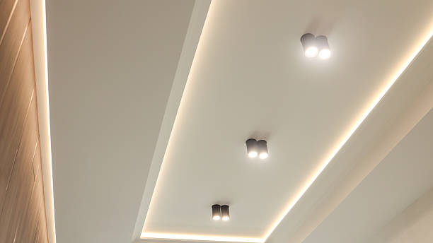 istock modern ceiling design with recessed lighting and decorative wooden paneling 2247549327