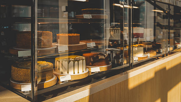 istock Delicious cakes displayed in a bakery shop window, ready to be purchased 2247551525