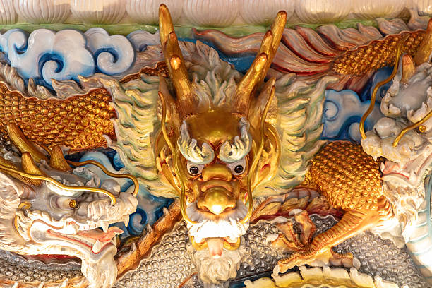 istock Ornamental dragon statue in Buddhist Temple. 2247554476