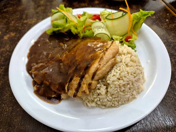 Black pepper rice with grilled chicken and mixed salad