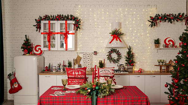 istock Festive Christmas kitchen decorated for the holidays with a dining table set. 2247557255