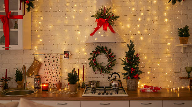 istock Cozy Christmas kitchen with festive decorations and fairy lights 2247557265