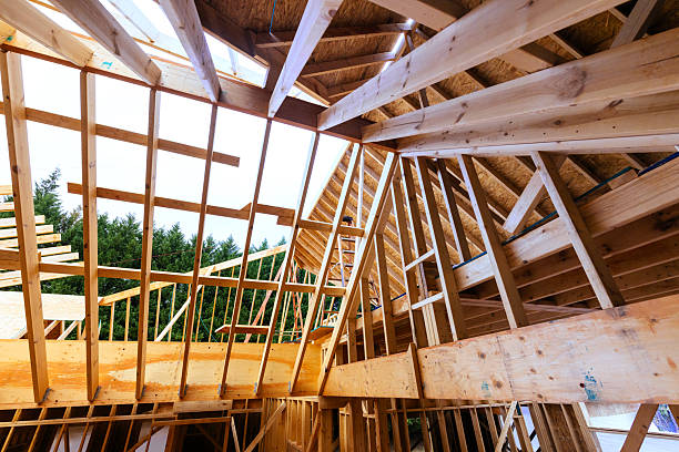 istock New house construction wooden beams timber studs roof framing 2247560890