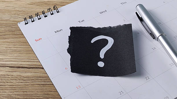 istock Appointment Date Question Concept with Calendar, Question Mark, and Pen Representing Scheduling Uncertainty and Planning 2247562635