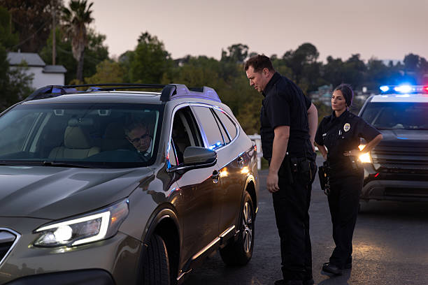 istock Two Police Officers Speaking to Driver During Traffic Stop 2247565663