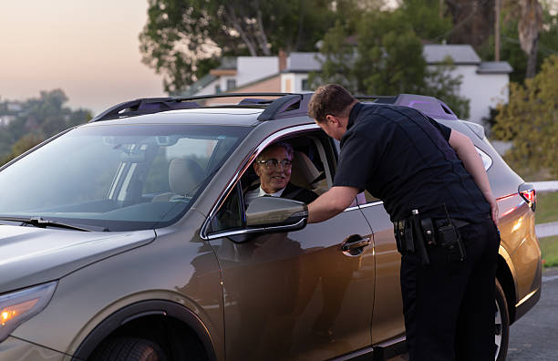 istock Driver Smiles at Police Officer During Traffic Stop 2247565664