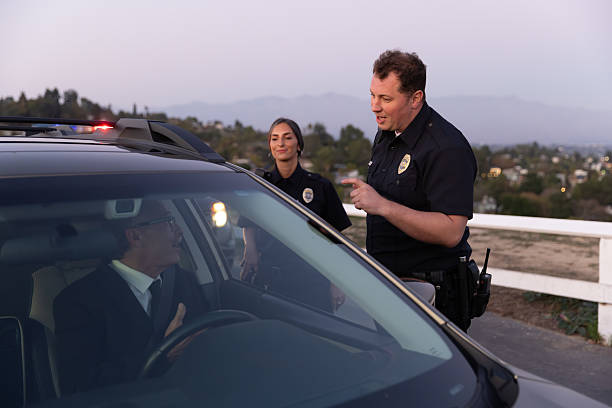 istock Police Officers Lecture Driver During Traffic Stop 2247565669