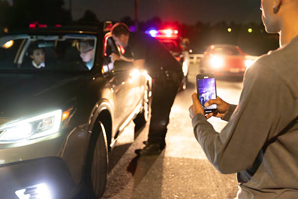 istock Bystander Records Interaction Between Police and Driver Pulled Over for Traffic Stop 2247565763