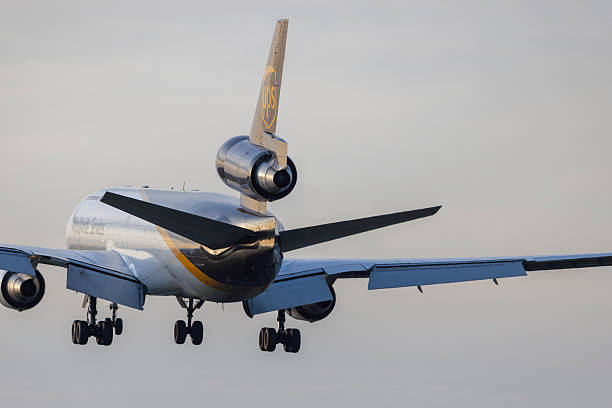 Portland, Oregon, USA - March 7, 2025: A UPS McDonnell Douglas MD-11 comes in for landing at Portland International.