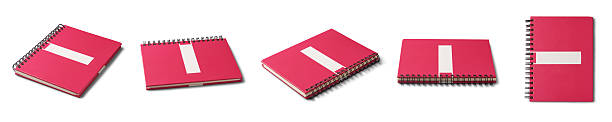 set of red spiral notebook with label isolated