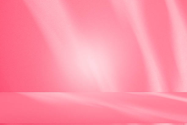 istock Wall interior background, studio, and backdrops show products. with shadow from window color white and pink light. background for text insertion and presentation of product 2247573689