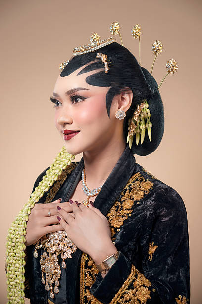 istock Elegant Javanese Bride with Traditional Indonesian Details 2247575563