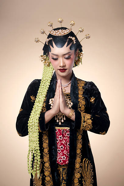 istock Elegant Javanese Bride in Traditional Greeting 2247575750