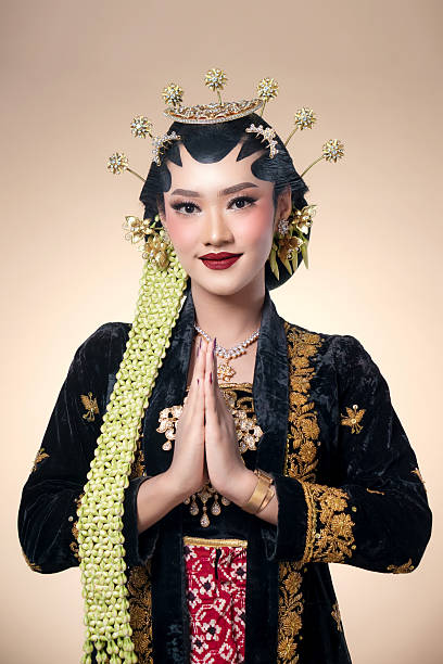 istock Graceful Javanese Bride with Traditional Greeting Pose 2247575753